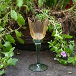 Theelichthouder in glas op voet tulpvorm geel